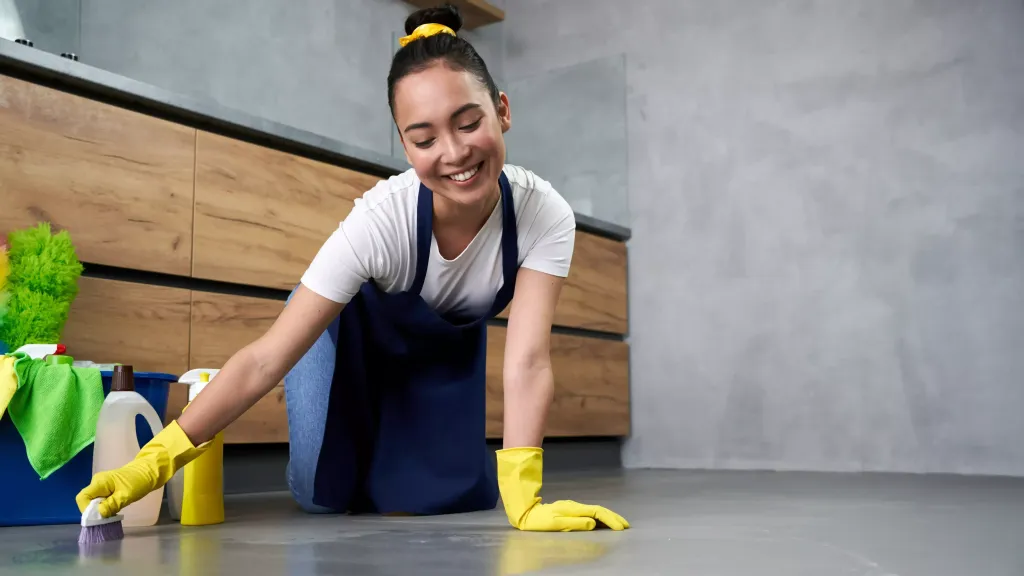 young-women-smiling-while-cleaning-house-edited-1024×576